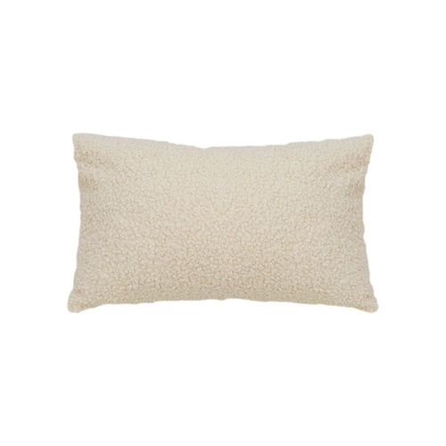 Cream boucle throw pillow styled on sofa modern Scandinavian living room