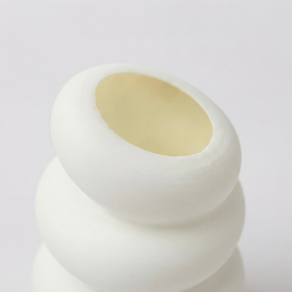 Spiral white nordic vase close up texture detail smooth spiral form