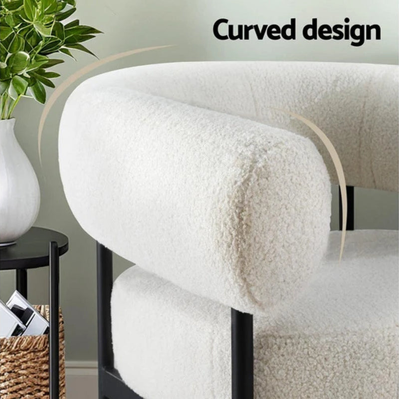White boucle accent armchair top view metal construction curved design