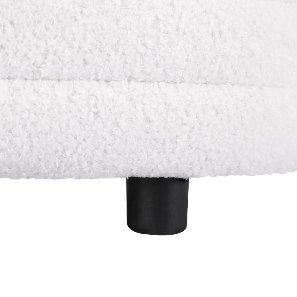 White boucle storage ottoman close up fabric texture soft padded seat detail