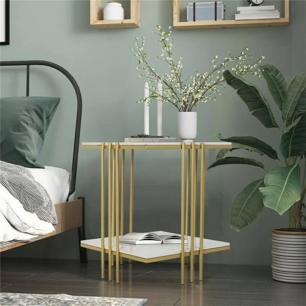 White gold two tier side table styled with vase flowers modern living room